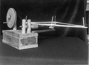Black and white image of an apparatus used for sewing