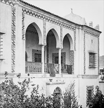 Moorish villa with windows protected by iron bars