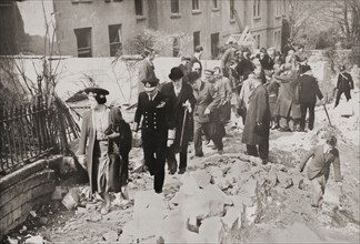 George VI and Queen Elizabeth visiting the damaged streets of Bath
