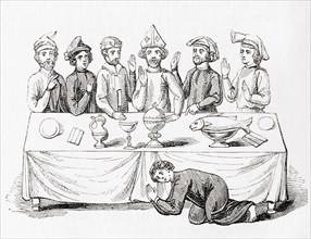 Saying grace before a meal in the Middle Ages