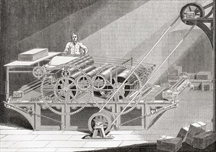A 19th century steam printing machine.  From Old England: A Pictorial Museum