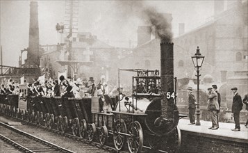 George Stephenson's railway engine making the journey from Stockton to Darlington in 1925 to mark its hundred years anniversary of the first journey in 1825.  From These Tremendous Years