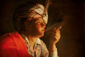 Young man smoking a pipe