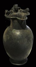 Pitcher of Valdegamas, for the libation ritual, On top of the handle, there are depicting a divinity, Potnia Theron