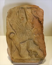 Pinax, Votive tablet decorated with sphinx with double Egyptian crown protecting the tree of life