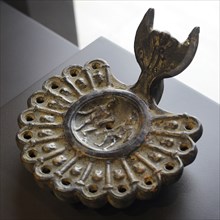 Roman lamp depicting a Gladiators fight