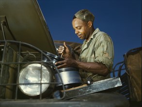 African American mechanic, motor maintenance section