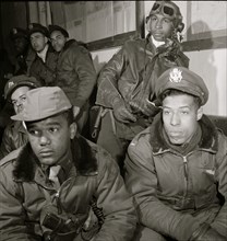 Photograph of Tuskegee airmen attending a briefing in Ramitelli, Italy, March 1945