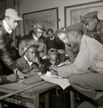 Several Tuskegee airmen at Ramitelli, Italy, March 1945