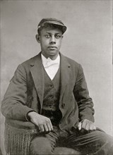 Portrait of an African American man, seated