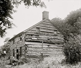 Three Negro Children in Old shack in Virginia Farm