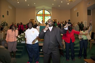 A congregation sings God's praises