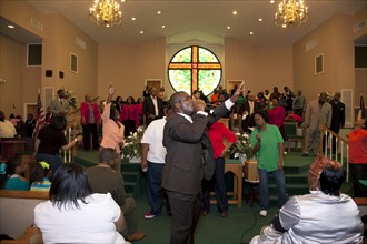 A congregation sings God's praises