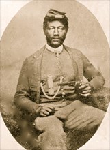 James H. Harris, three-quarter length portrait, seated, facing front