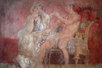Man and woman seated side by side