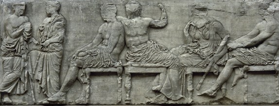 Zeus and Hera seated.