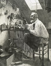 Craftsman in his workshop. Engraving. 19th century.