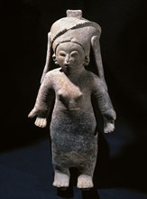 Ceramic female figure.