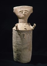 Clay anthropomorphic figure.