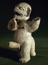 Ceramic male figure.