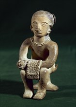 Ceramic figure made in mold.