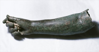 Bronze arm belonging to a Roman statue.
