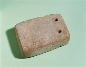 Roman weight for a loom.