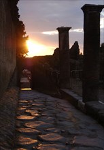 Pompeii. Sunset on a cobbled street.