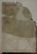 A slab with dedication to L. Iulius Iulianus, prefect of the praetorship.