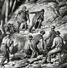 Workers preparing the demolition of a hillside to build the tunnel of the Apennines.