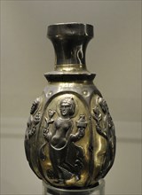 Vase with female figures.