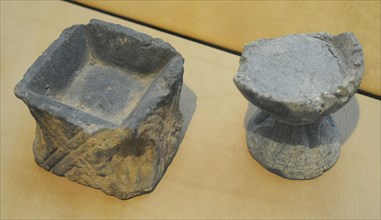Oil lamps made of soapstone clay were alternatives to tallow candles.