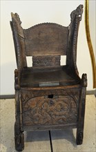 Carved wooden chair.