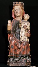 Gothic  Virgin Mary with Divine Infant. Wood carving made in 14th century. Episcopal Museum of Vic. Catalonia.