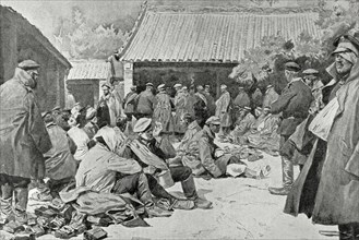 Russian soldiers wounded and convalescing in a village in Manchuria.
