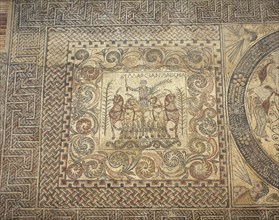 The Aurigas mosaic. 4th century. The victoriuos charioteer Marcianus with his chariot. Merida. Spain.