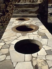 Marble covered counter Thermopolium.