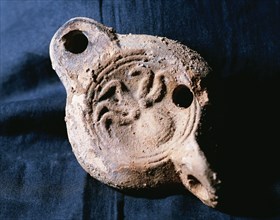 Roman oil lamps. Terracotte. Octopus decoration. From Catalonia. Spain.
