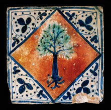 Renaissance style. Tile of Manises. 15th century. Heraldic shield of Oliver family. Diocesan Museum. Barcelona. Spain.