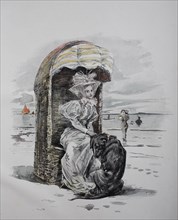 Woman and dog in beach chair on the North Sea