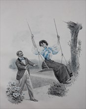 Couple playing with the swing