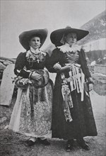 Bride and bridesmaid in the traditional dress of Val Gardena