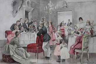 Adolescents celebrate at a family celebration in a separate room  /  Jugendliche feiern bei einer Familienfeier in einem separaten Raum