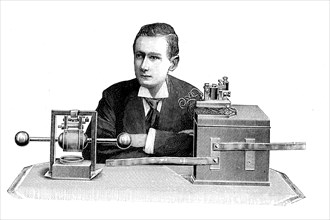Guglielmo Marconi demonstrating apparatus he used in his first long distance radio transmissions in the 1890