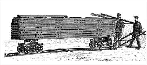 Verlegung von Eisenbahnschienen  /  Laying of railroad tracks