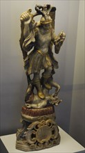 Statue of the Archangel Michael, slaying Satan as a dragon
