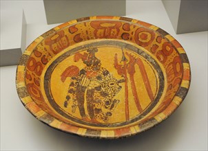 Plate with figurative and geometric decoration