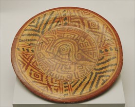 Plate with schematic and geometric decoration