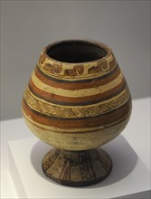 Cup with geometric decoration