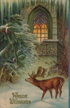 Historical Christmas card with a winter motif with deer and church